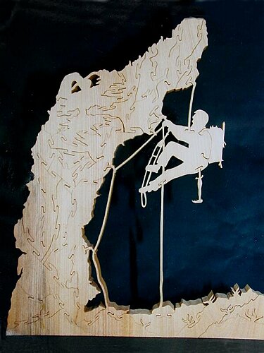 Dcoupe en bois massif. Sculpture "Le Grimpeur" de Pascal Veuillet